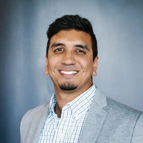 Smiling male dental professional headshot